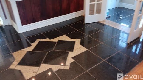 A black and white checkered floor in a room.
