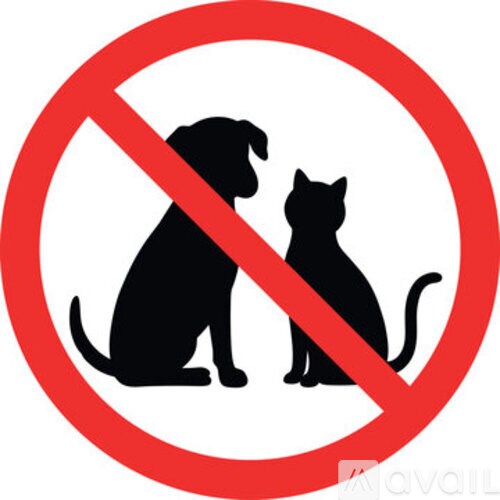 A sign with a red circle and a diagonal line over a dog and cat.