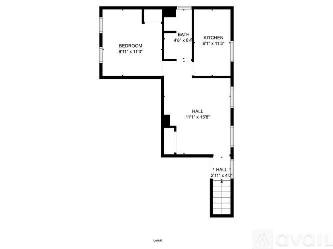 A floor plan of a small apartment with a bedroom, kitchen, and two halls.