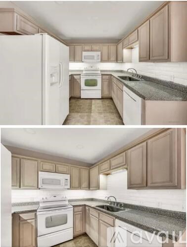 A kitchen with white appliances and brown cabinets.