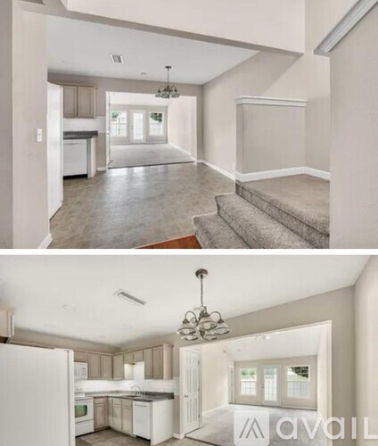 A modern kitchen with a refrigerator, sink, and cabinets.