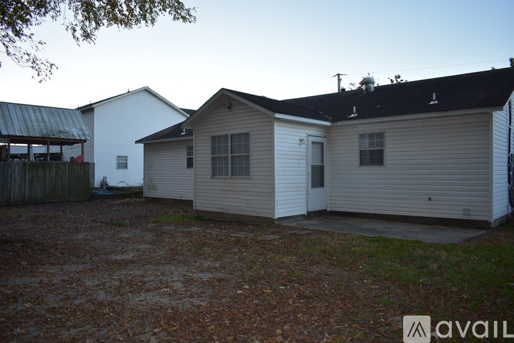 A house with a garage is available for rent.