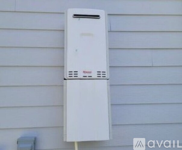 A white box mounted on a wall.