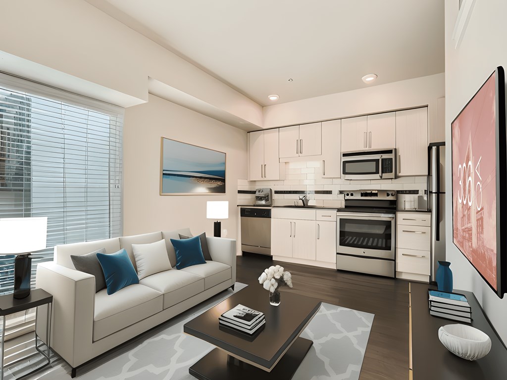 a white living room with a white couch and a table