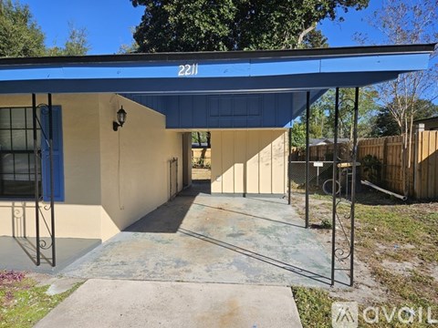A blue awning with the number 221 on it.