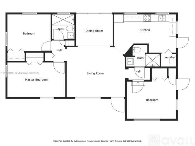 A floor plan of a house with a master bedroom, two bathrooms, a dining room, kitchen, living room, and two additional bedrooms.