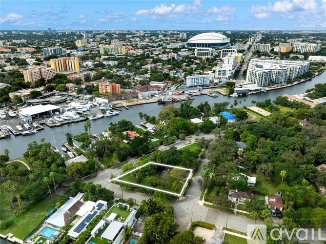 An aerial view of a city with a river running through it.