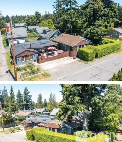 A two-story house with a red roof and a blue house with a brown roof.