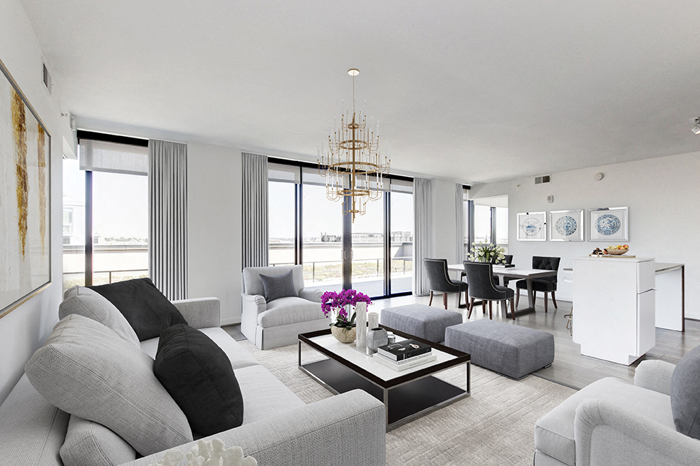 a white living room with couches and chairs and a table