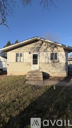 A small house with a front porch is shown in the image.