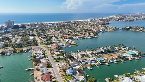 A coastal city with a mix of residential and commercial buildings.