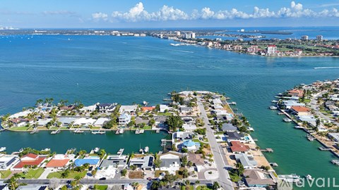 A coastal town with a marina and boats.