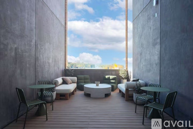 A patio with a table and chairs is available for rent.