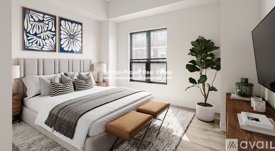 A well-lit bedroom with a large bed, a bench, and a potted plant.