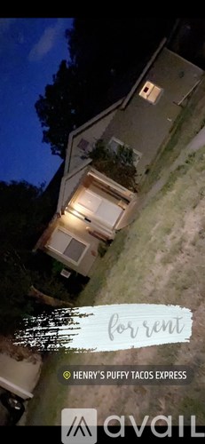 A house is for rent and is located near Henry's Puffy Tacos Express.
