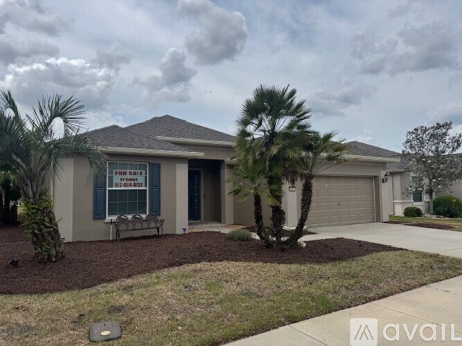 A house with a sign that says "available" in front of it.