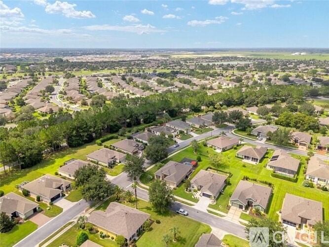 A suburban neighborhood with houses and streets.