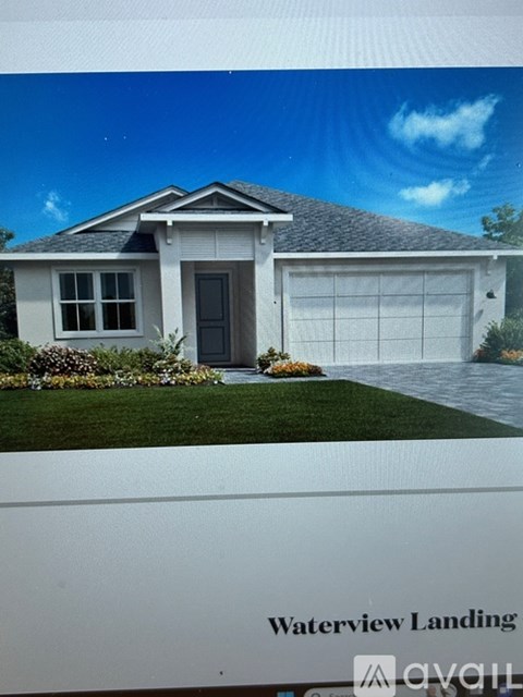 A house with a garage is for sale at Waterview Landing.