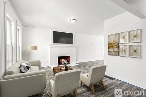 A living room with a fireplace, a television, and a painting on the wall.