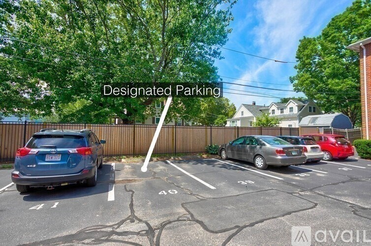 A parking lot with a sign that says "Designated Parking".