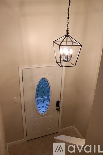 A door with a blue circular window in the middle of it.