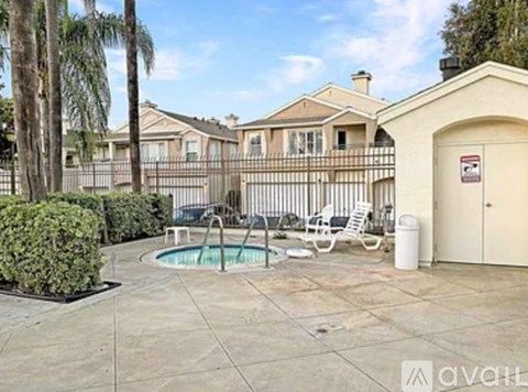 A house with a pool in the backyard.