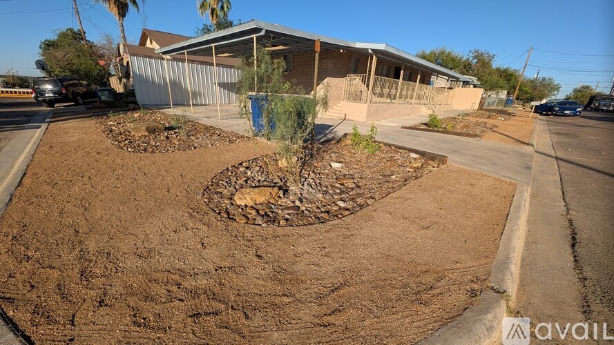 A building with a blue sign in front of it.
