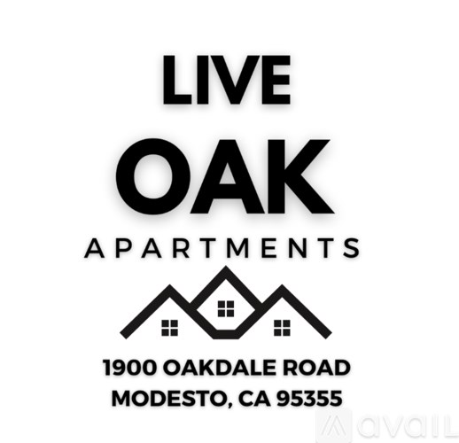 A black and white image of a sign for Live Oak Apartments.
