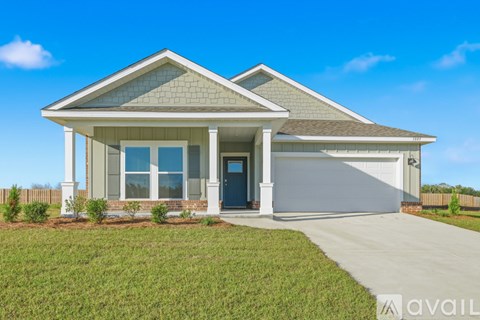 A house with a blue sky in the background.