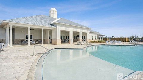 A pool and pavilion with a sign that says "available".