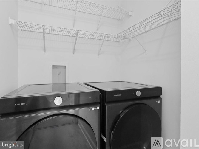 Two Samsung front load washing machines are available for sale.