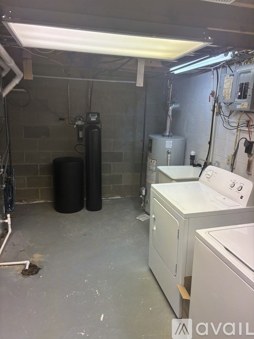 A laundry room with a washer and dryer.