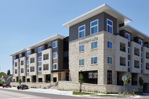 A multi-story building with the name "Interim Points" on the front.