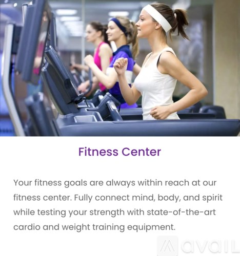 A group of people exercising on treadmills in a fitness center.