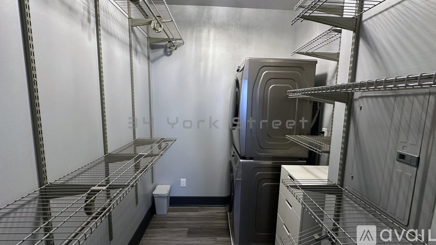 A storage room with a washing machine and dryer.