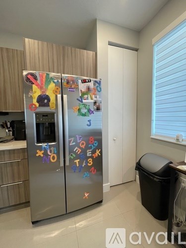 A fridge with letters and numbers on it.