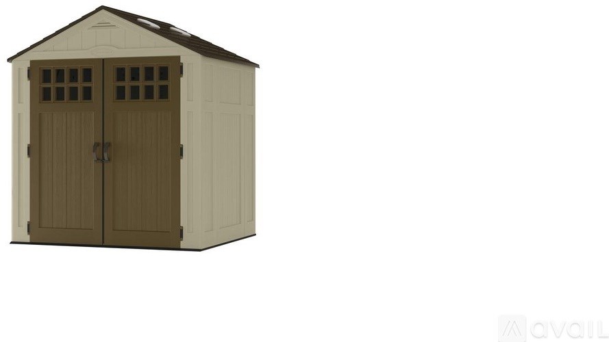 A brown and white shed with a brown door and windows.