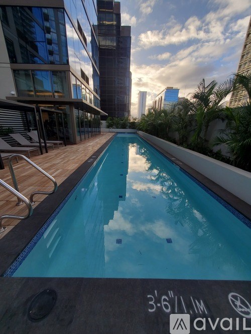 A swimming pool with the text "3-611M available" on the side.