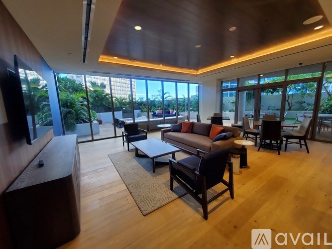 A living room with wooden floors and furniture.