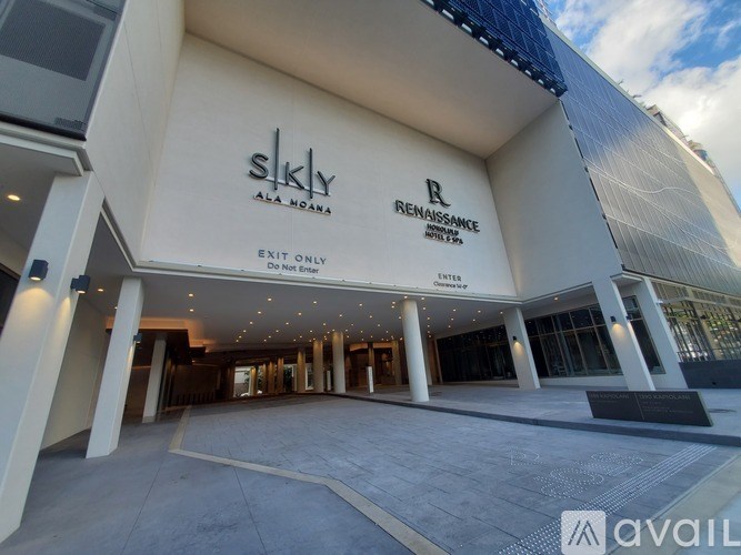 The image shows the exterior of a building with a sign that reads "Sky" and "Renaissance."