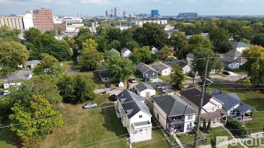 A suburban neighborhood with houses and trees.