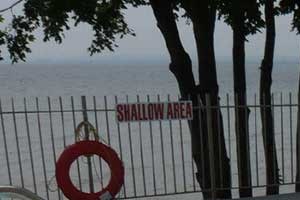 Outdoor pool with full lake view. Thumbnail click to zoom. - Photo Gallery 3