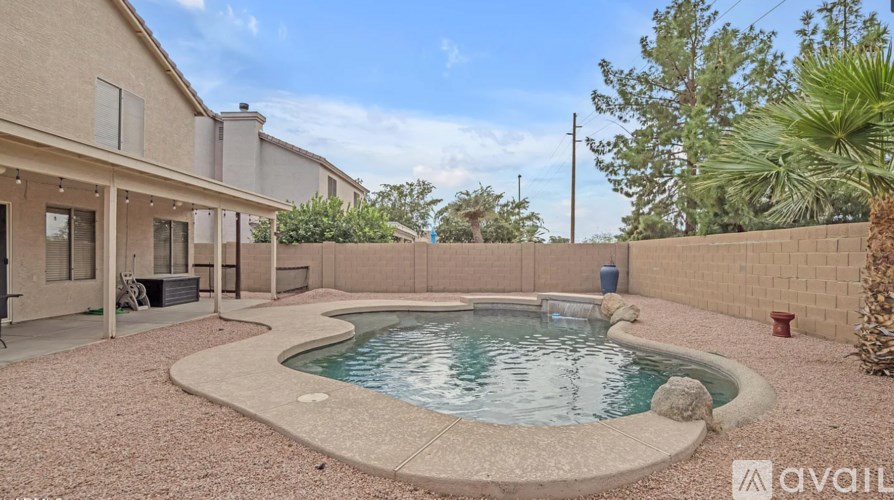 A house with a pool in the backyard.