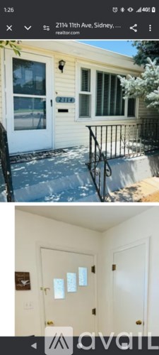 A white door with a glass window is on the left side of the image.