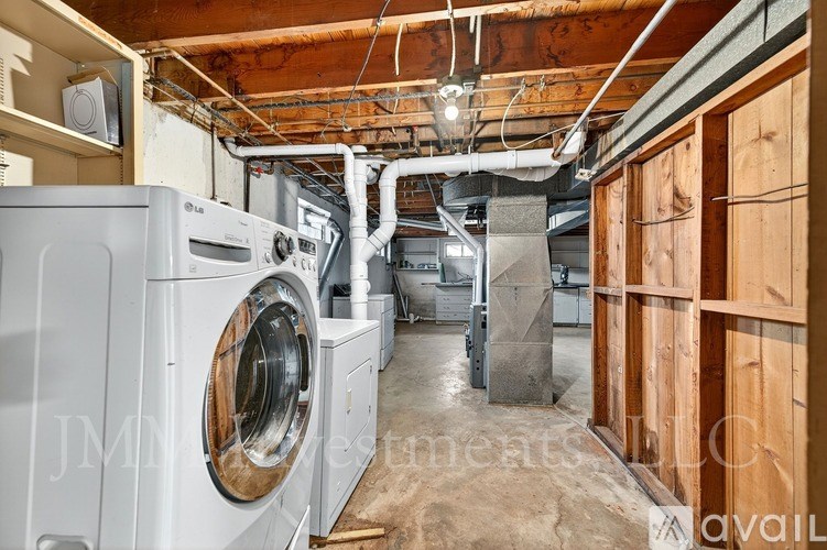 A laundry room with a washer and dryer.