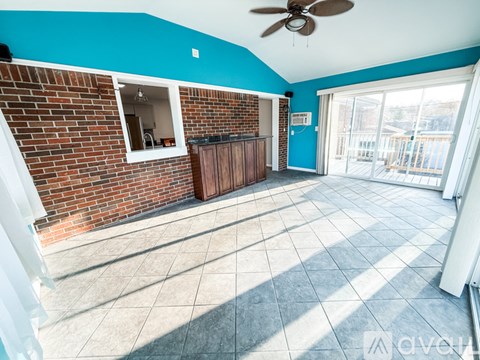 A kitchen with a stove top oven and a dishwasher.