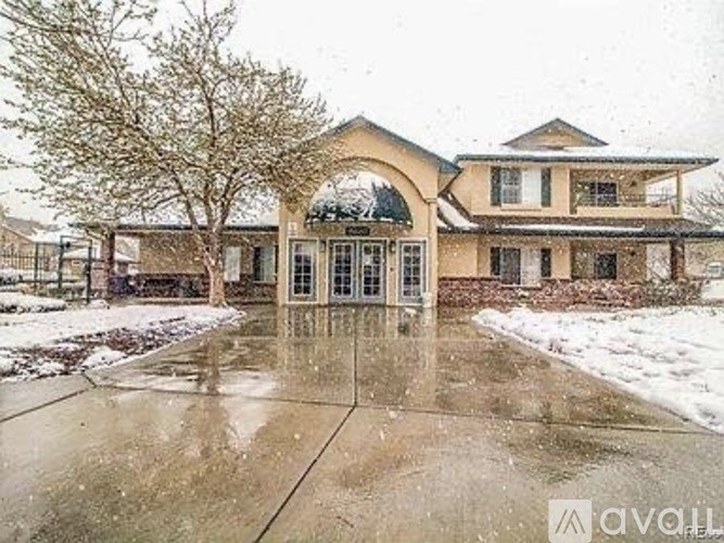 A house with a driveway in front of it.