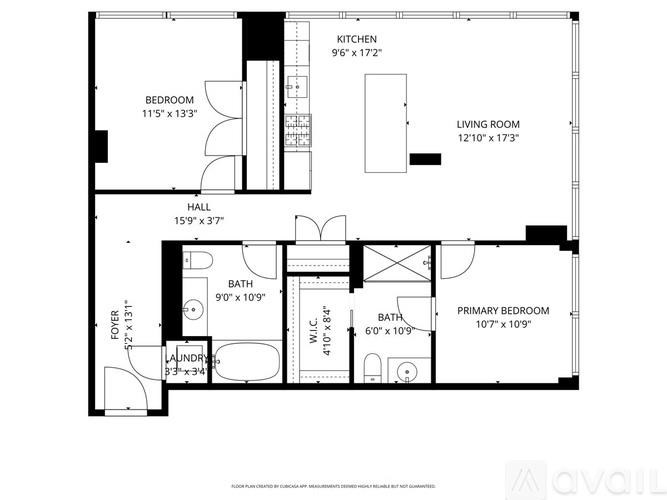 A floor plan of a house with a living room, kitchen, and two bathrooms.