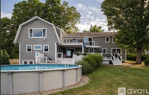A house with a pool in the backyard.