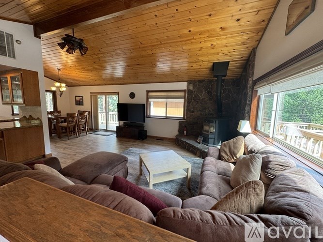 A living room with a fireplace and a couch.